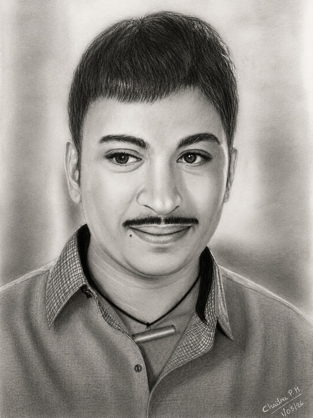 Dr. Rajkumar Legendary Kannada Actor hand-drawn charcoal portrait by Chaitra Draws